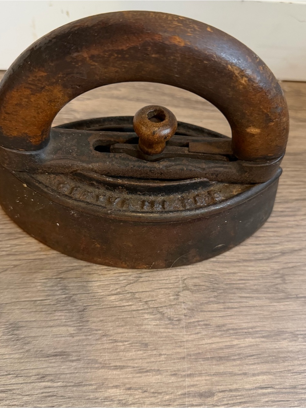 Antique Cast Iron sad Iron with wood handle
